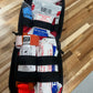 Portable bleeding control kit with tourniquet, bandages, and trauma supplies for schools and workplaces