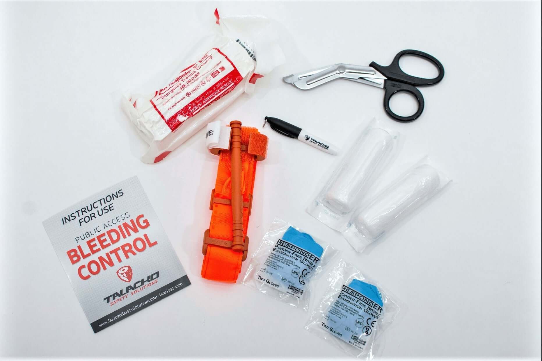 Portable bleeding control kit with tourniquet, bandages, and trauma supplies for schools and workplaces