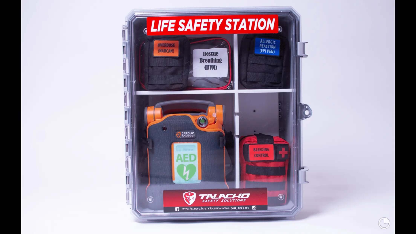 Life Safety Station, one enclosure with adjustable shelves Life safety station combining AED, first aid, and trauma kits for community and workplace safety